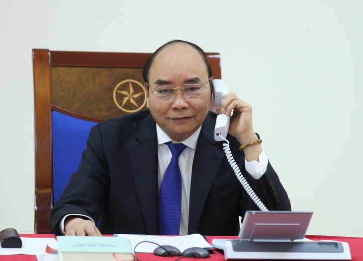 Premierminister Nguyen Xuan Phuc führt ein Telefonat mit seinem australischen Amtskollegen Morrison - ảnh 1