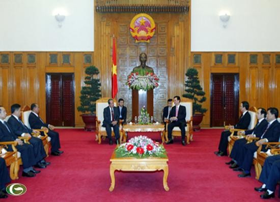 PM Vietnam, Nguyen Tan Dung menerima delegasi tingkat tinggi Laos - ảnh 1