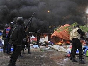 Polisi memperingatkan akan menggunakan peluru sungguhan untuk menghadapi demonstrasi di Mesir. - ảnh 1