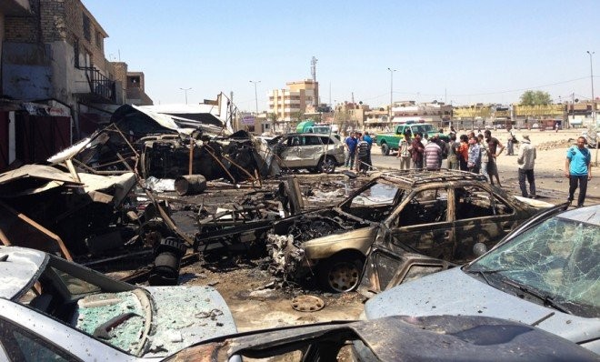 Ibukota Baghdad, Irak terguncang dalam serangan-serangan bom baru - ảnh 1