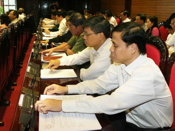 MN Vietnam  mengesahkan Resolusi mengenai rencana anggaran keuangan negara tahun 2014 - ảnh 1
