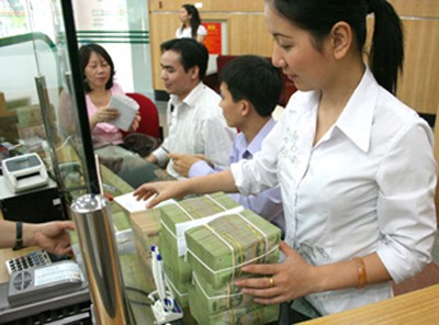 MN Vietnam mengesahkan Resolusi mengenai anggaran keuangan negara tahun 2014 - ảnh 1
