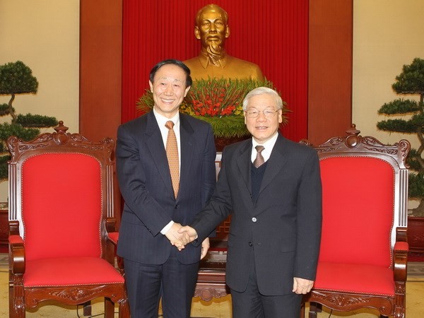 Sekjen Nguyen Phu Trong menerima Kepala Departemen Hubungan Luar Negeri Komite Sentral Partai Komunis Tiongkok - ảnh 1