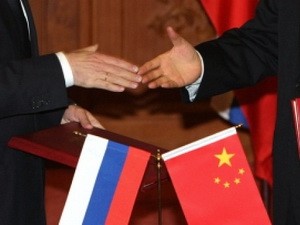 Tiongkok dan Rusia sepakat memperkuat investasi satu sama lain - ảnh 1