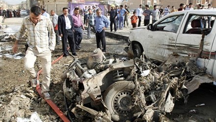 Kira-kira 70 orang mendapat luka-luka dalam serentetan serangan bom mobil di Irak - ảnh 1