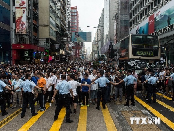 Beberapa sekolahan di Hong Kong (Tiongkok) terus ditutup, pegawai negeri bekerja kembali - ảnh 1