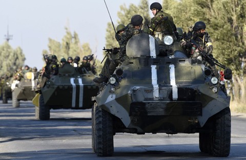 Bahaya terjadinya perang total di Ukraina Timur - ảnh 1