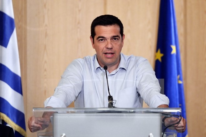 Parlemen Yunani mengesahkan permufakatan untuk menerima paket talangan internasional senilai 85 miliar Euro - ảnh 1