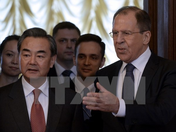 Rusia dan Tiongkok berkomitmen melakukan kerjasama dalam masalah-masalah internasional - ảnh 1