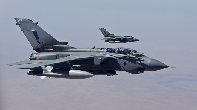 Parlemen Inggris belum menyepakati rencana serangan terhadap IS di Suriah - ảnh 1