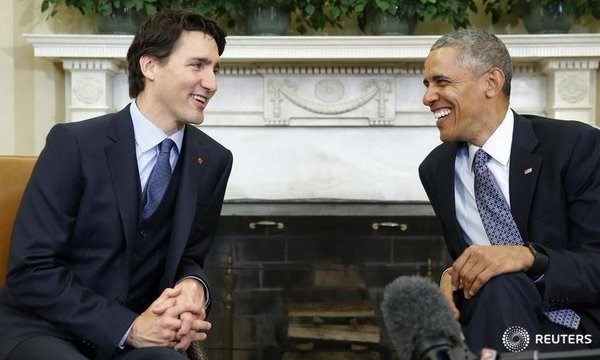 AS, Kanada berkomitmen mendorong TPP dan menanggulangi perubahan iklim - ảnh 1