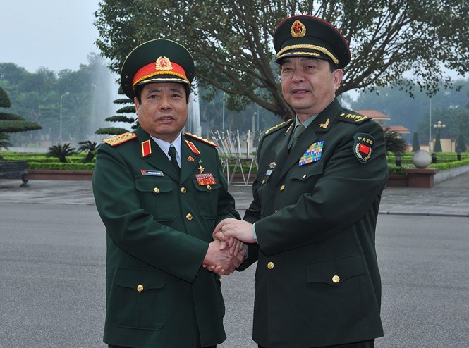 Menhan Tiongkok melakukan kunjungan persahabatan resmi di Vietnam - ảnh 1