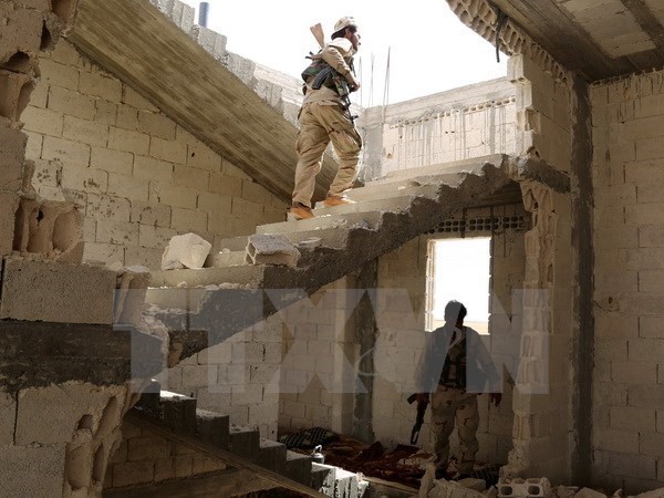 Tentara Suriah terus menyerang benteng IS - ảnh 1