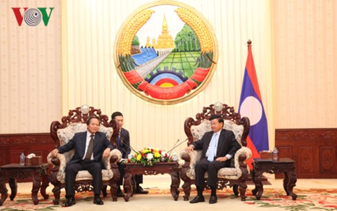 PM Laos meminta kepada dua negara Laos dan Vietnam supaya memperkuat kerjasama tentang keamanan cyber - ảnh 1