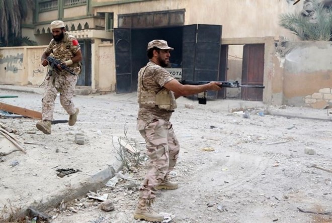 Puluhan militan IS dibasmi di Sirte - ảnh 1