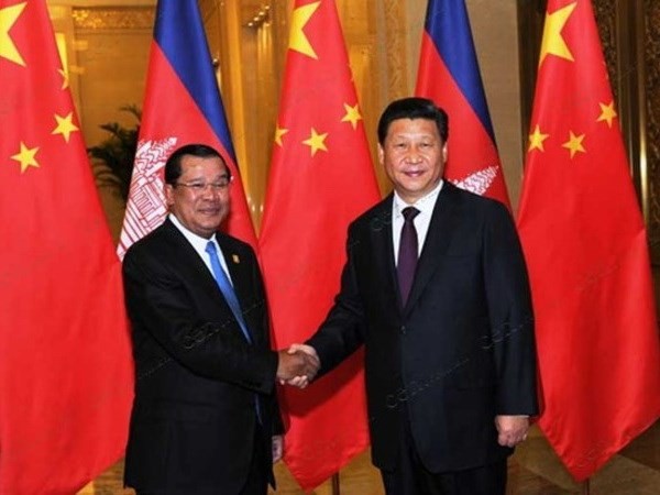 Tiongkok dan Kamboja memperkuat hubungan kemitraan strategis - ảnh 1