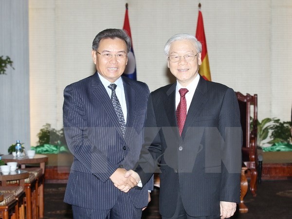 Sekjen KS PKV Nguyen Phu Trong menerima Ketua Pengurus Besar Front Pembangunan Tanah Air Laos, Ketua Asosiasi Laos-Vietnam - ảnh 1