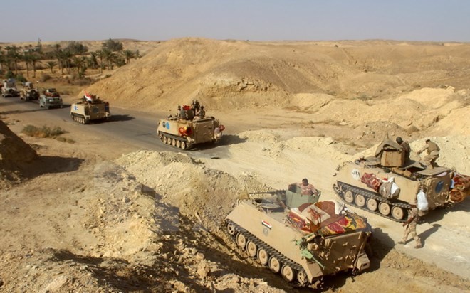 Irak membuka operasi untuk merebut kembali kawasan Barat yang diduduki  IS - ảnh 1