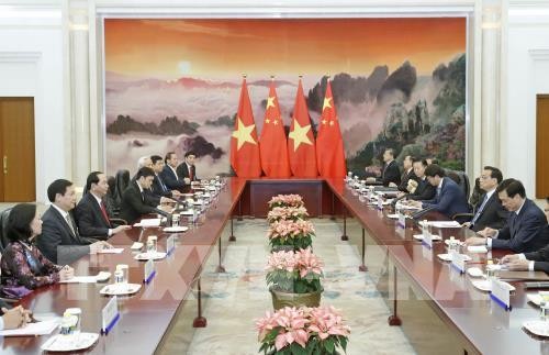  Presiden Vietnam, Tran Dai Quang melakukan pertemuan dengan PM Tiongkok, Li Keqiang - ảnh 1
