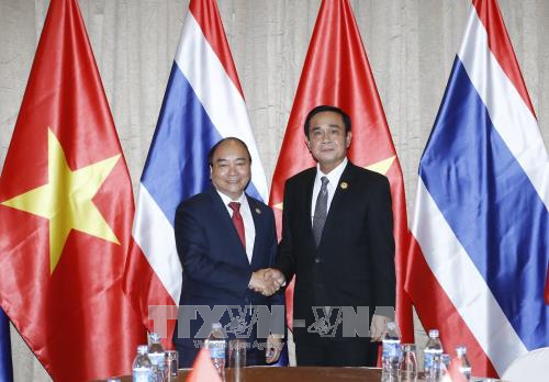 Membawa hubungan kerjasama strategis Vietnam dan Thailand semakin menjadi intensif, efektif dan berkesinambungan - ảnh 1