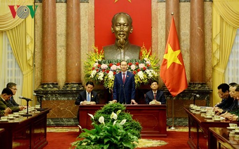 Presiden Vietnam, Tran Dai Quang menerima delegasi warga negara Laos yang berjasa kepada revolusi Vietnam - ảnh 1