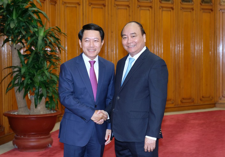  PM Vietnam, Nguyen Xuan Phuc menerima Menlu Laos, Saleumxay Kommasith - ảnh 1