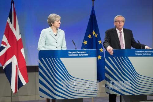  Inggris berkomitmen akan menghormati permufakatan Brexit sementara dengan Uni Eropa - ảnh 1