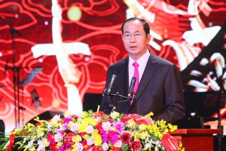 Presiden Tran Dai Quang: Ibu Pertiwi selalu menyambut putra-putri yang tercinta pulang kembali ke kampung halaman - ảnh 1