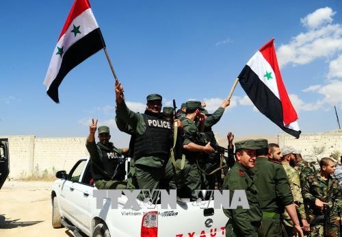   Suriah: Kelompok-kelompok pembangkang terus menarik dari daerah-daerah di dekat Kota Damaskus - ảnh 1