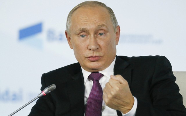Presiden Vladimir Putin merasa bangga akan kekuatan senjata nuklir Rusia - ảnh 1