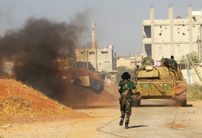 Tentara Suriah memperkuat operasi pembersihan membasmi para militan IS - ảnh 1