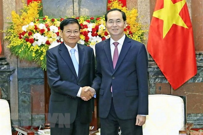 Laos mengumumkan acara belasungkawa nasional untuk mengenangkan Presiden Viet Nam, Tran Dai Quang, dari 26-27/9 - ảnh 1