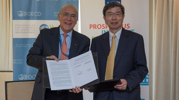 ADB dan OECD bekerjasama untuk mendorong perkembangan di Asia-Pasifik - ảnh 1