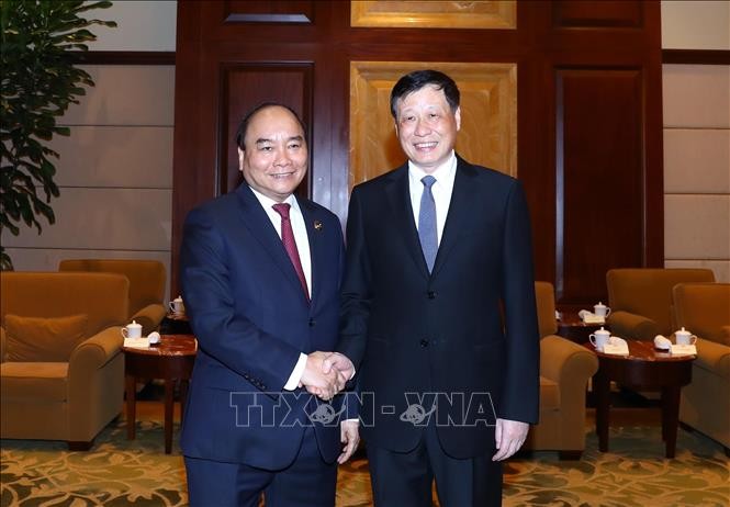 PM Viet Nam, Nguyen Xuan Phuc mengakhiri dengan baik program kehadiran pada CIIE 2018 - ảnh 1