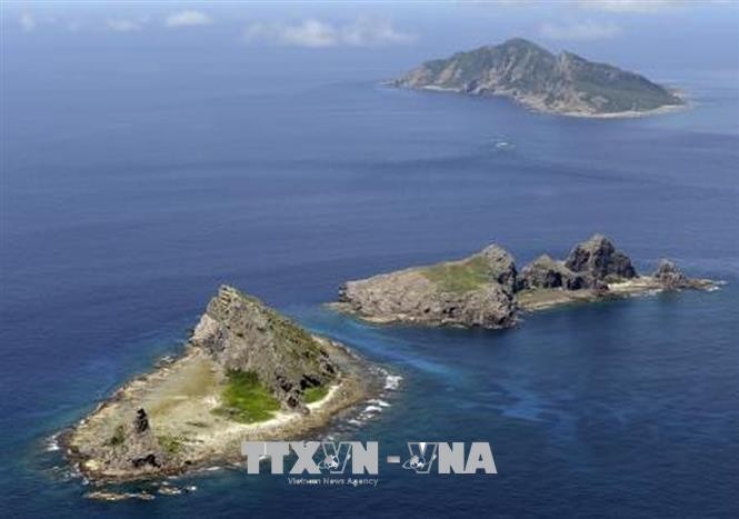 Jepang menuduh kapal polisi laut Tiongkok melanggar wilayah laut - ảnh 1