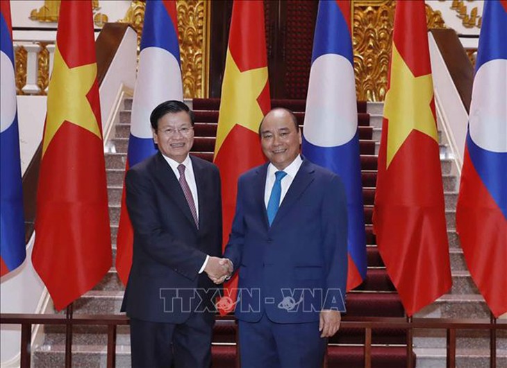 PM Laos Mengunjungi Vietnam - ảnh 1