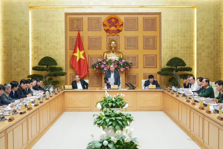 Badan Harian Pemerintah Vietnam mengadakan sidang tentang pencegahan dan penanggulangan wabah COVID-19 - ảnh 1