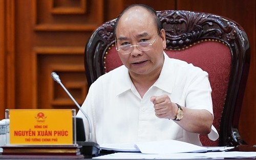 PM Vietnam, Nguyen Xuan Phuc meminta kepada para ekonom supaya memberikan ide untuk menyerap arus modal investasi - ảnh 1