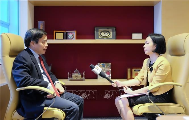 Pakar Mengapresiasi Hasil Kunjungan PM Pham Minh Chinh ke Singapura - ảnh 1
