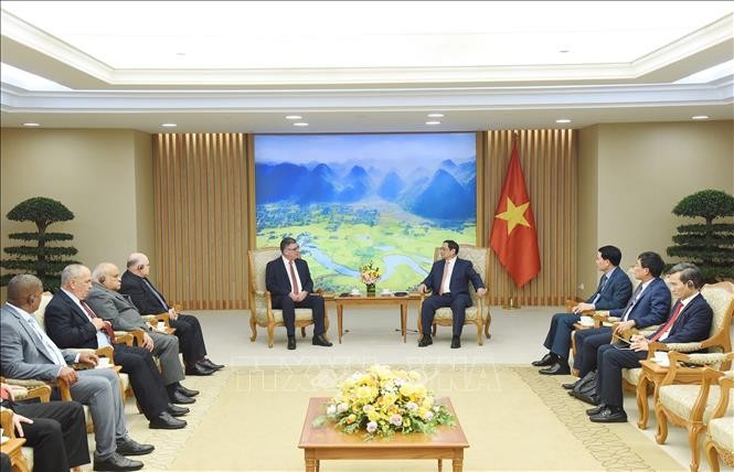 PM Vietnam, Pham Minh Chinh Menerima Menteri Dalam Negeri Kuba - ảnh 1