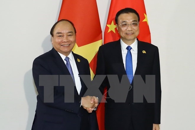 PM meets with Chinese, Thai counterparts - ảnh 1