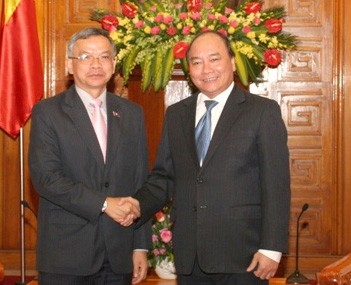 Вице-премьер Вьетнама принял министра общественных работ и транспорта Лаоса - ảnh 1