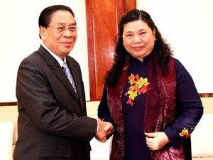 Президент Лаоса принял высокопоставленную делегацию Вьетнама - ảnh 1