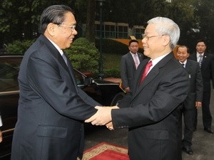 Руководители Вьетнама провели переговоры с генсеком ЦК НРПЛ, президентом Лаоса - ảnh 1