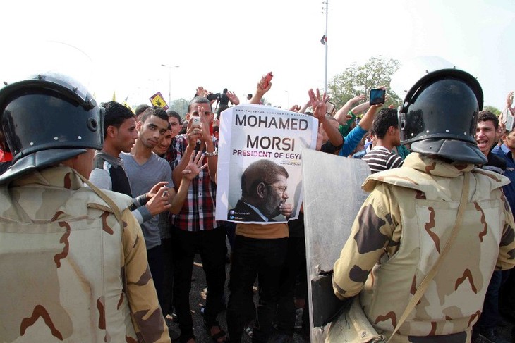 В Египте усилены меры безопасности перед судом над Мурси - ảnh 1