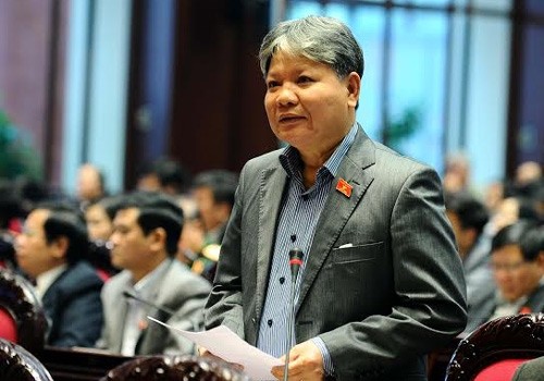 Члены правительства Вьетнама отвечают на запросы депутатов Парламента страны - ảnh 1