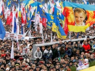 В Киеве прошла акция протеста против отказа от Соглашения об ассоциации с ЕС - ảnh 1