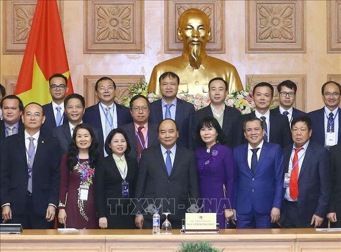 Нгуен Суан Фук принял руководителей предприятий, удостоенных звания «Национальный бренд» - ảnh 1
