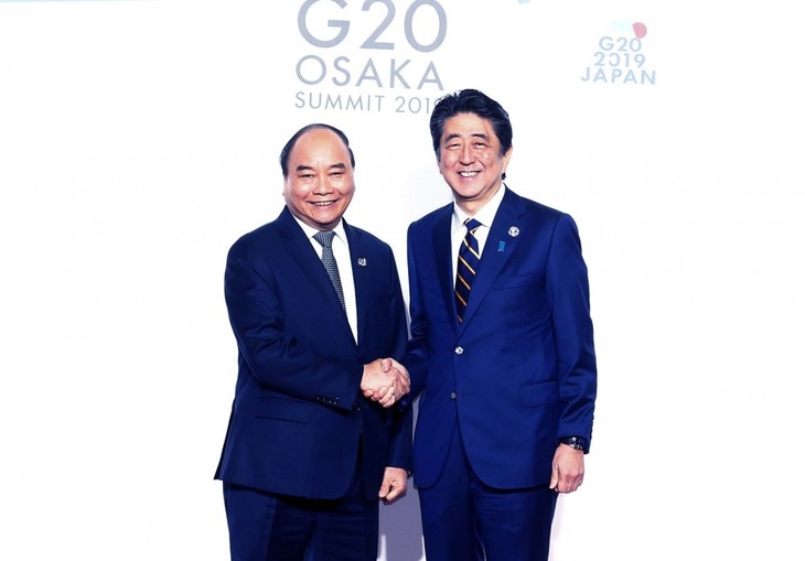 Премьер-министр Нгуен Суан Фук принимает участие в различных мероприятиях в рамках саммита G20 - ảnh 1