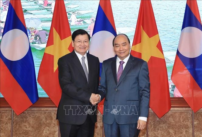 Вьетнам и Лаос обсудили стратегию сотрудничества на ближайшие 10 лет - ảnh 1